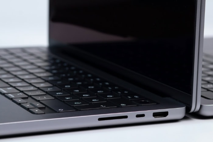 Side view of laptop showing USB C ports and keyboard