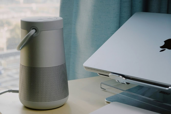 Silver Bose SoundLink Revolve plus on office desk