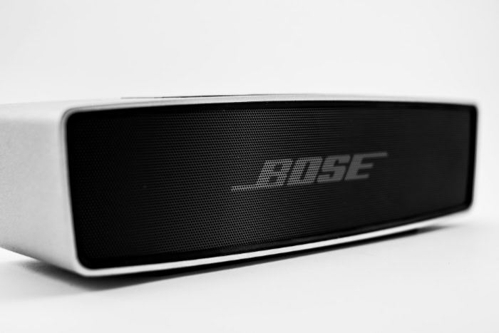 Silver Bose portable Bluetooth speaker close up
