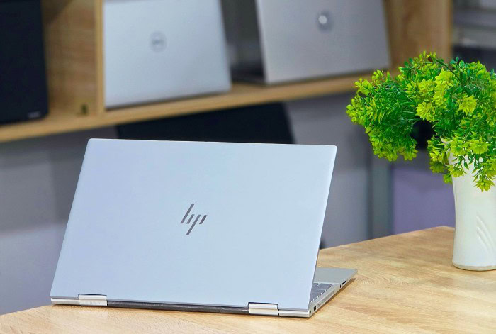 Silver HP Envy laptop lid with minimalist logo