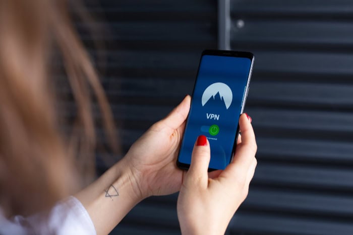 Smartphone displaying VPN app with mountain logo