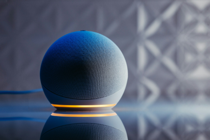 Spherical Amazon Echo with orange glowing light ring