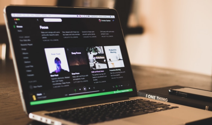 Spotify on silver laptop