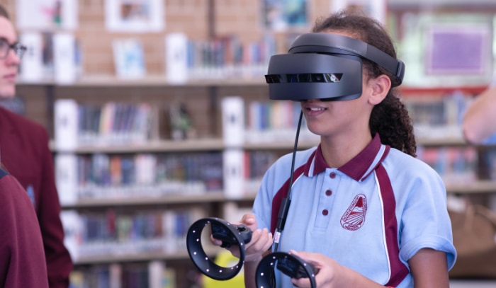 Student wearing black virtual reality