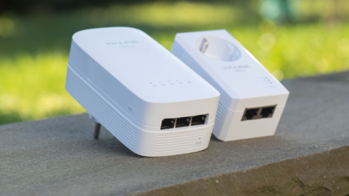 TP Link powerline adapters on a stone ledge