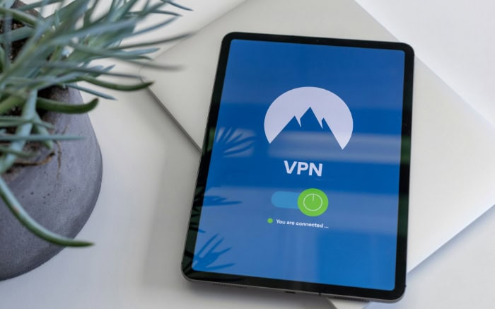 Tablet displaying VPN app with mountain logo