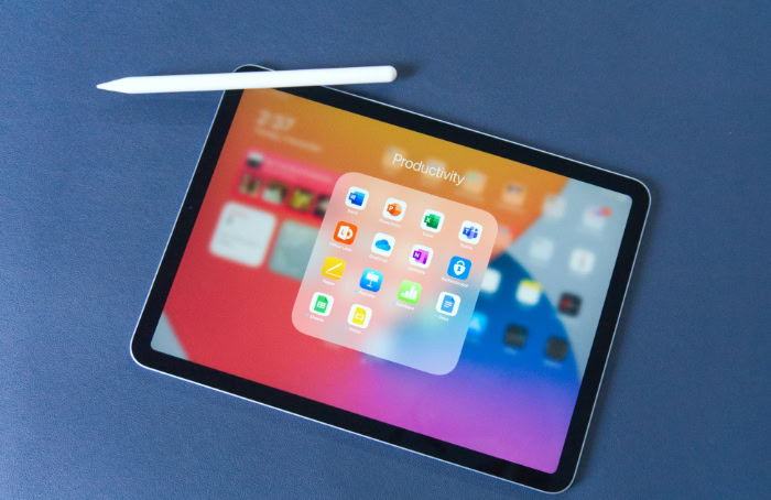 Tablet displaying productivity apps with a digital pen nearby