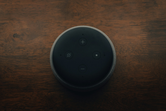 Top view of charcoal Amazon Echo Dot speaker