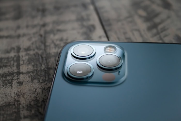 Triple camera setup on iPhone Pro in pacific blue color