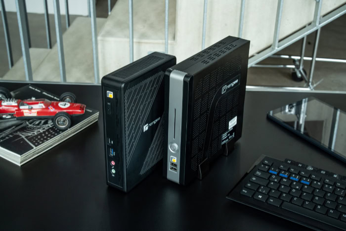 Two thin client desktops on office desk setup