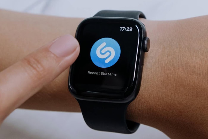 User interacting with Shazam on a smartwatch