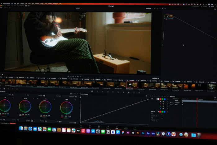 Video editing software open on large monitor