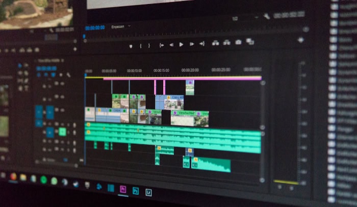 Video editing timeline interface with multiple tracks and clips