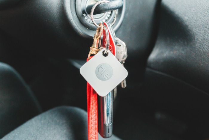 White Tile Bluetooth tracker attached to car keys