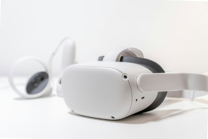 White VR headset and controllers on a clean surface