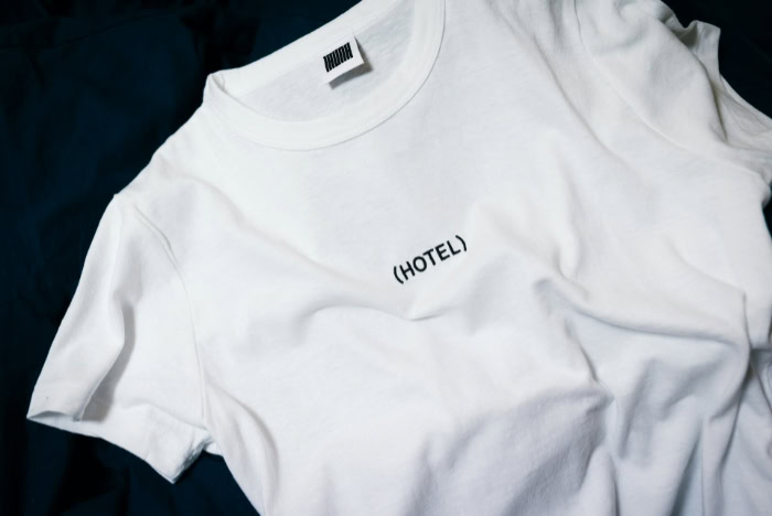 White crewneck t shirt with black Hotel print