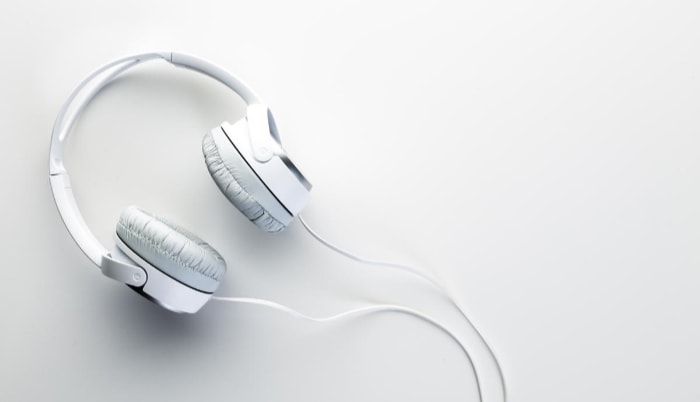 White headphones on white surface