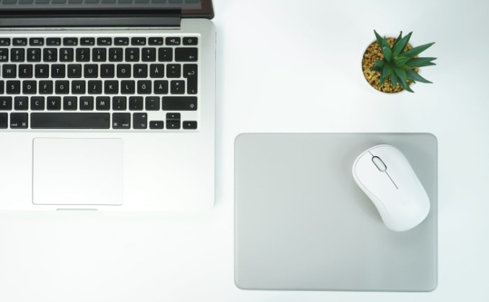 White mouse on mousepad