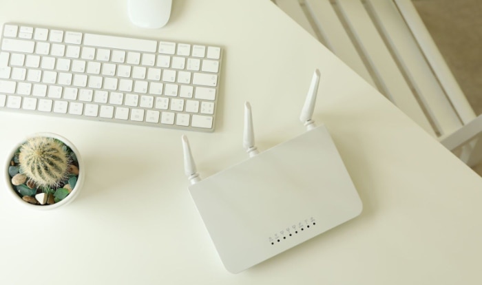 White wifi router on white table