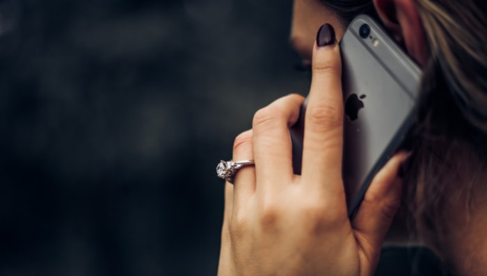 Woman making a call on iphone 6s