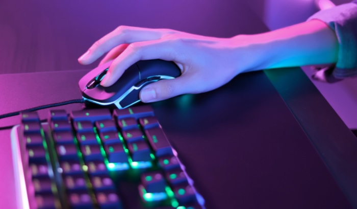 Woman using RGB mouse