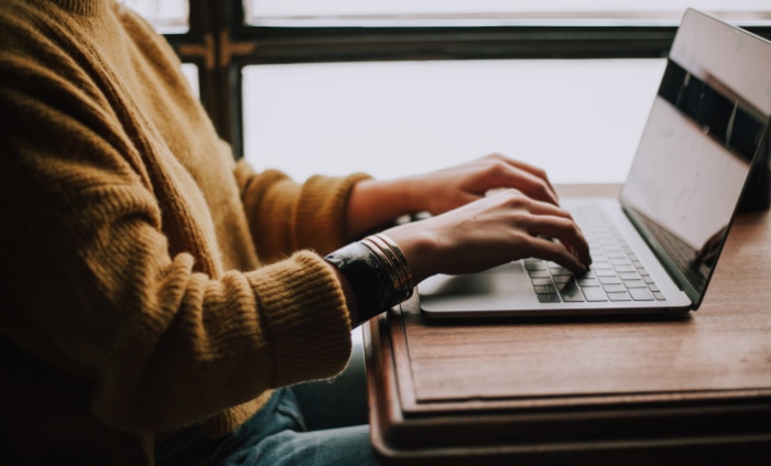 Woman using laptop 1