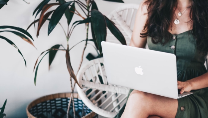 Woman using macbook 1