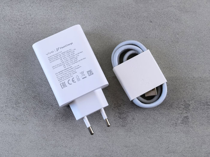 vivo FlashCharge adapter with coiled white USB cable