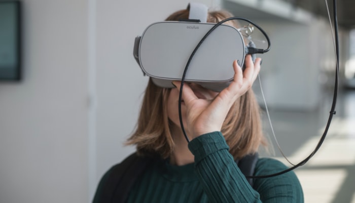 Woman wearing white virtual reality